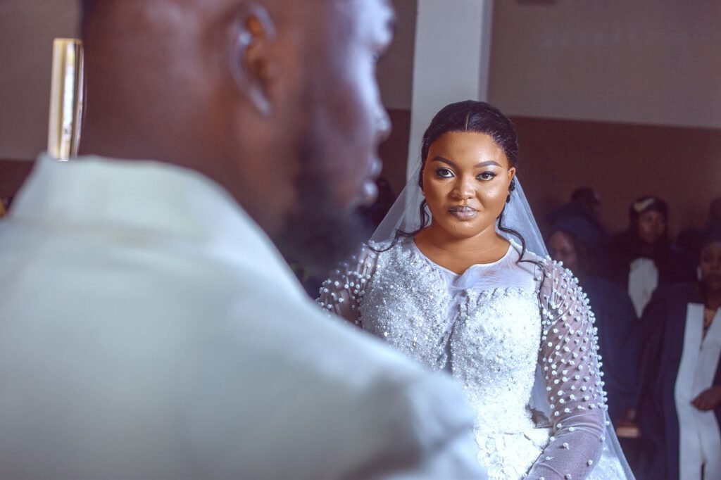pexels photo 30367305 Captivating wedding moment captured during a ceremony in Jos, Nigeria featuring a bride and groom.
