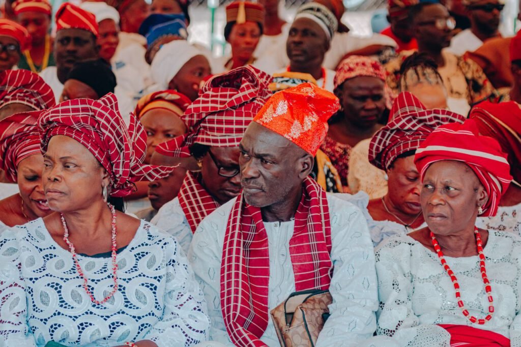 pexels photo 30879260 A vibrant display of cultural attire at a Nigerian gathering showcasing traditional clothing and headwear.