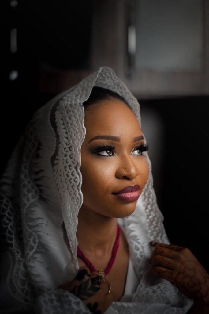 Portrait of a Nigerian woman in traditional attire, showcasing elegance and cultural beauty.